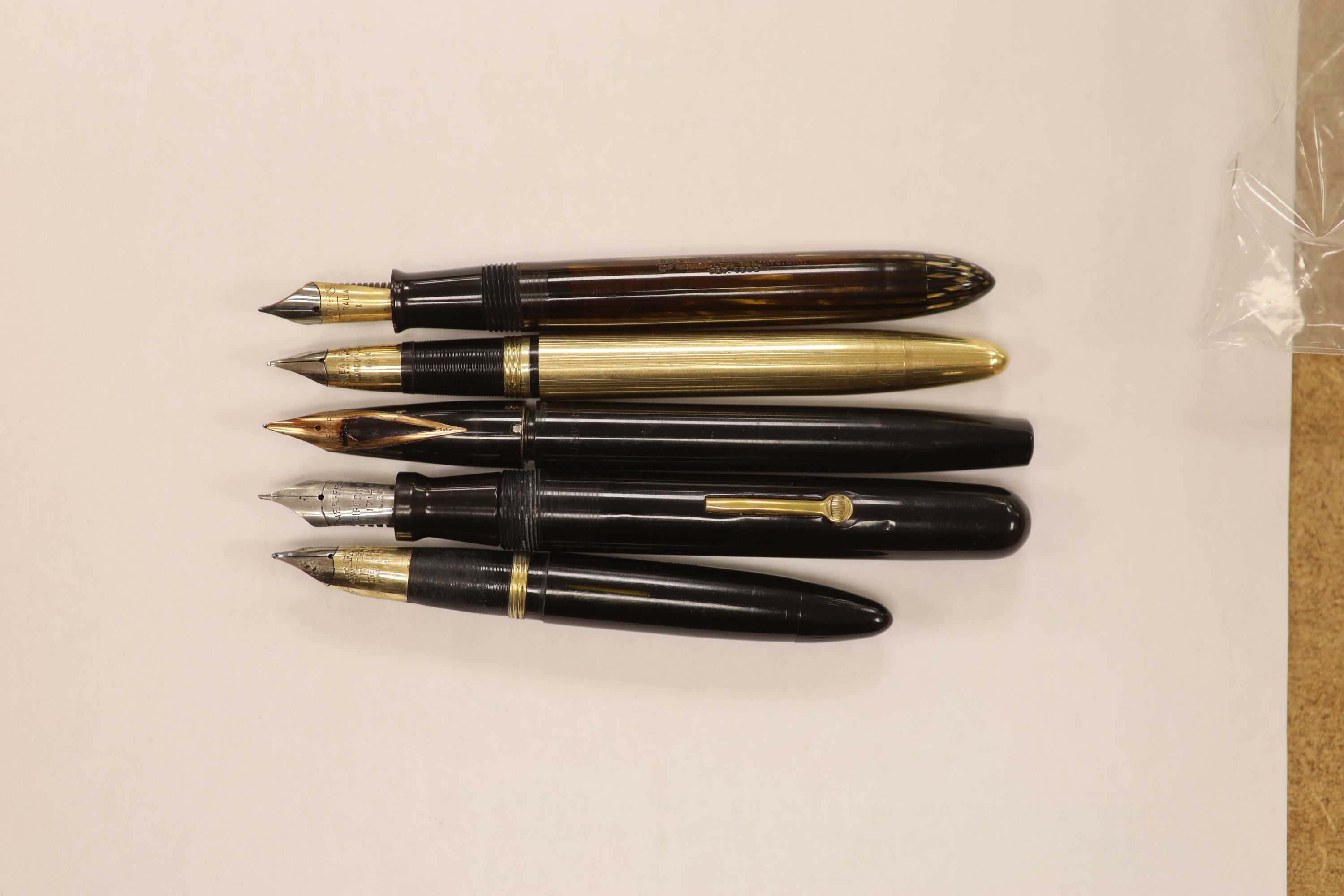 Five Sheaffer fountain pens